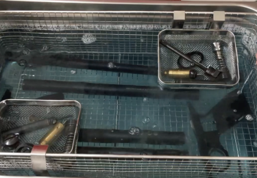 Ultrasonic gun cleaning machine